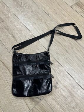 Black Shiny Crossbody Bag with Dual Zip Pockets